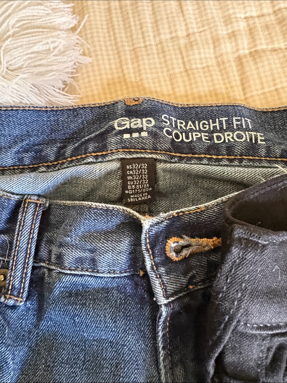 Straight Fit Mens Dark Blue Jeans and Black Hollister jean.